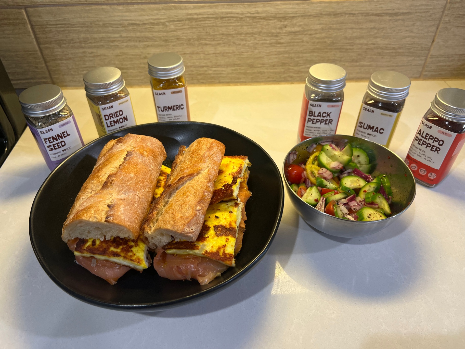 Smoked salmon sandwich with cucumber salad